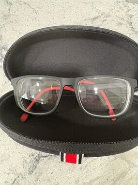 Carrera never wornBlack Frame Glasses with Red and snap on to create sunglasses.